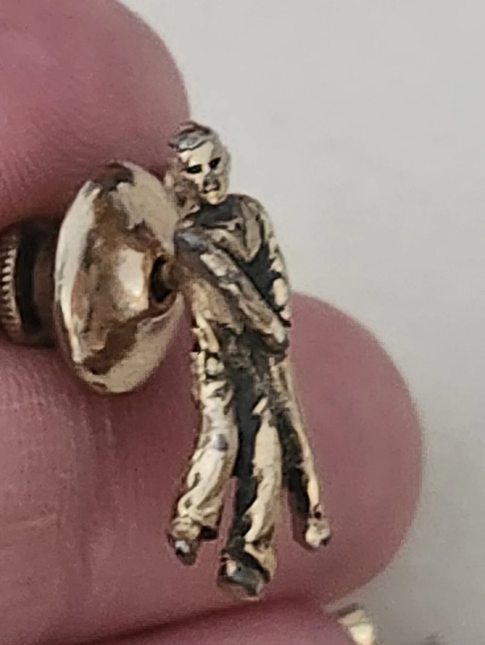 Gold-Tone Golfer Hitting Ball Figure Lapel Pin